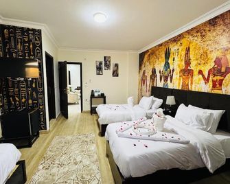 Phoenix Pyramids View Inn - Cairo - Phòng ngủ