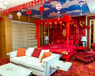 Oriental Lily Hotel - Lüliang - Bedroom