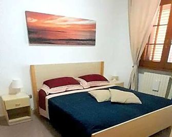 B&B Stars and Stripes - Monopoli - Camera da letto