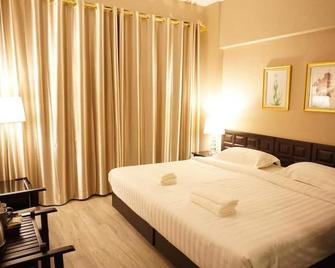 Taris Art Hotel Phrae - Phrae - Bedroom