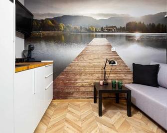Affordable Underground Micro Apartment Grochowska by Noclegi Renters - Varsovie - Salon