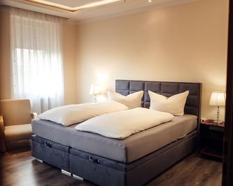 Hotel und Restaurant Peking - Riesa - Camera da letto