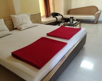 Hotel Aaditya Palace - Bhusāwal - Bedroom