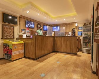 Pousada Das Hortensias - Campos do Jordão - Front desk