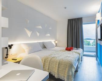 Pharos Hvar Bayhill Hotel - Hvar - Phòng ngủ
