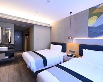 Home Inn Neo Beijing Ping'anli Metro Station - ปักกิ่ง - ห้องนอน