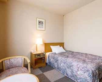 Fukuno Town Hotel Amieux - Nanto - Schlafzimmer