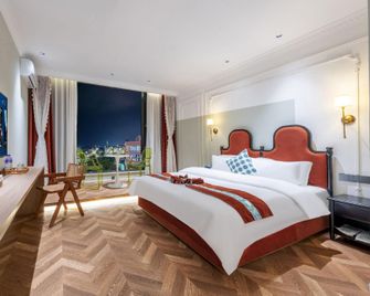 Youzigui Humanities & Esports Hotel (Dongxing Community Branch) - Qujing - Bedroom