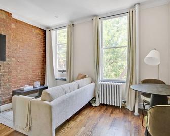 Sunny Nolita 1BR w/ W/D nr SoHo, by Blueground - New York - Living room