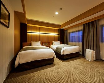 Sendai Kokusai Hotel - Sendai - Yatak Odası