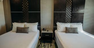 Calafia Hotel - Mexicali - Schlafzimmer