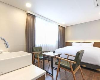Anyang Cnc Hotel - Anyang - Habitación