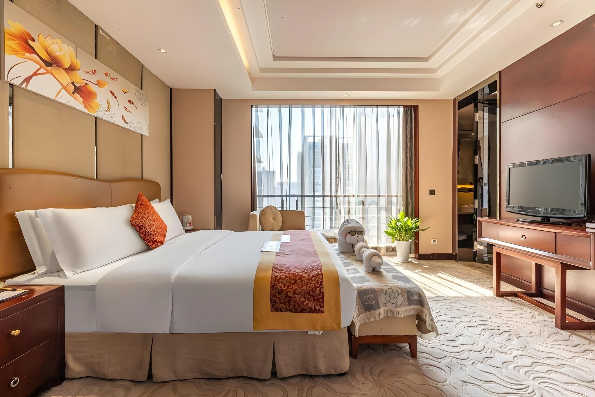 شينغشا هواتيان جراند هوتل - تشانغشا - غرفة نوم