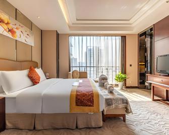 Xingsha Huatian Hotel - Changsha - Bedroom