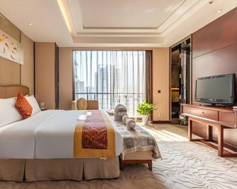 Xingsha Huatian Hotel - Changsha - Bedroom
