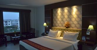 Airport City Hotel - Kolkata - Bedroom
