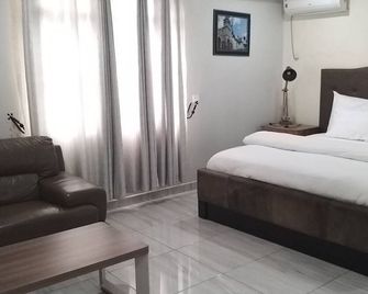 Mitos Luxury Suites - Lagos - Makuuhuone