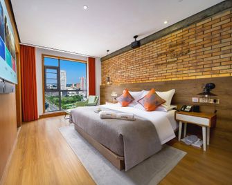 Mango One Huayue Hotel - Nanyang - Bedroom