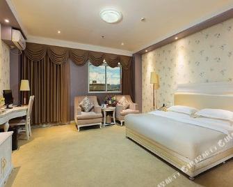 Pu'er Meiqiang Hotel - Pu'er - Bedroom