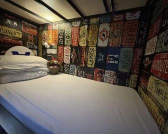 Qiannuo Youth Hostel - Hangzhou - Schlafzimmer