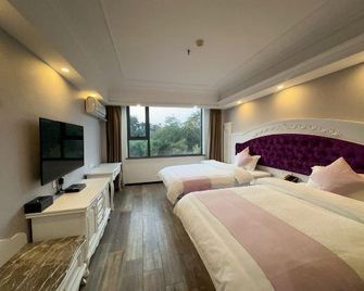 Milannuo Business Hotel - Гуїлін - Спальня