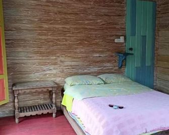 Hotel y Estadero Los Colores - Aquitania - Habitación