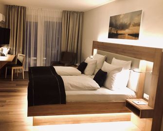Four Stars by City Hotel - Meckenheim - Habitación