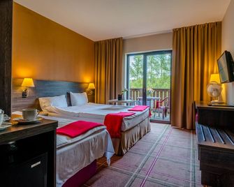 Mikolajki Resort by DeSilva - Mikołajki - חדר שינה