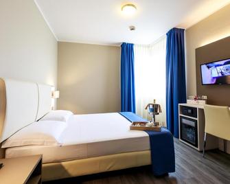 Hotel Oleggio Malpensa - Oleggio - Schlafzimmer