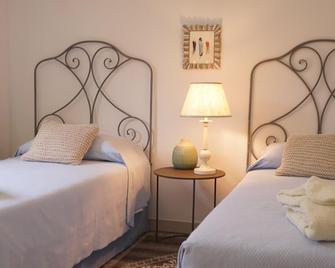 Casagliana Suite Resort - Olbia - Slaapkamer