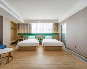 Fuji International Hotel (Kashgar Wanda Plaza International Exhibition Center) - Kashgar - Bedroom