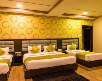 هوتل بودا - فاراناسي - غرفة نوم