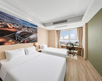 Xincheng Hotel (Yantai University International Expo Center Branch) - Yantai - Quarto