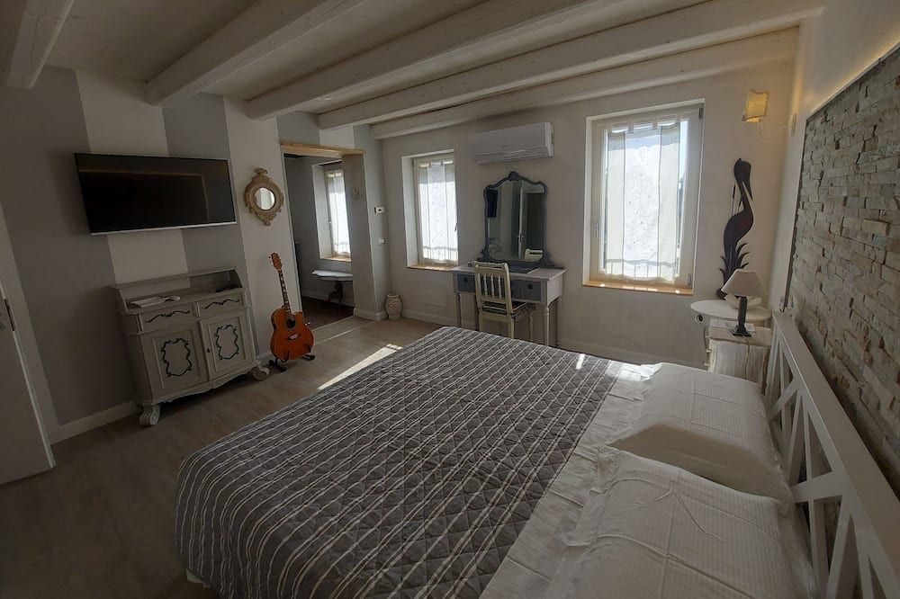 B&B Corte Colli Antichi - סונה - חדר שינה