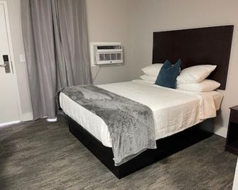 The Inn - Council Bluffs - Κρεβατοκάμαρα