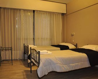 هوستال راينتراي - بويرتو مادرين - غرفة نوم