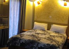 Mvuli suites, Sunyee Studio Apartments - Nairobi - Bedroom