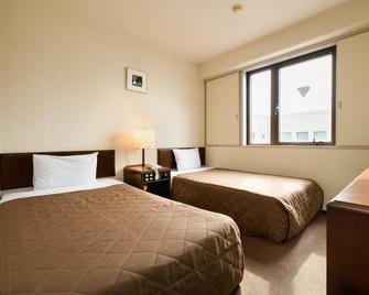 Tabist Kameyama Daiichi Hotel - Kameyama - Slaapkamer