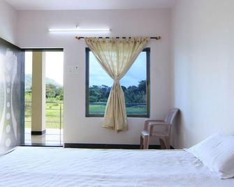 Nisarg Guest House - Alibag - Habitación
