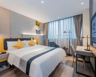 Home Inn Style Shanghai Dahua Xincun Road Metro Station - شنغهاي - غرفة نوم