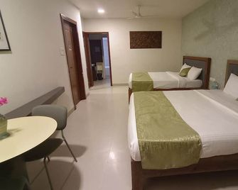 Amazinn Hotel - Lonavala - Спальня