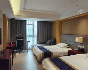 South Beauty Hotel - 淮安 - 臥室