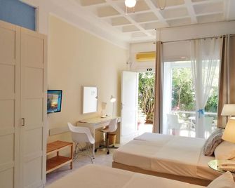 هوملي استوديوز - Chios - غرفة نوم