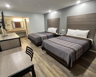 Continental Inn & Suites - Nacogdoches - Schlafzimmer