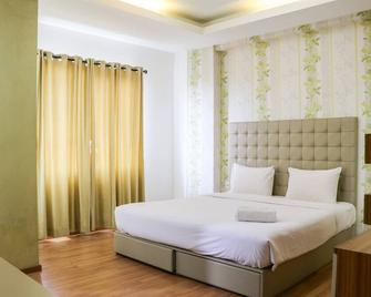 Spacious Studio The Edge Bandung Apartment By Travelio - Bandung - Bedroom