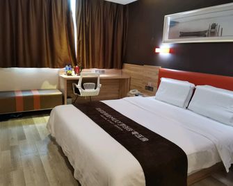 7 Days Premium Kaifeng Gulou Square Millennium City Park - Kaifeng - Bedroom