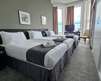 The Strand Hotel - איסטבורן - חדר שינה