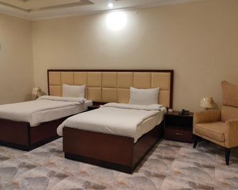 Hotel Sr Lounge Multan - Multān - Bedroom