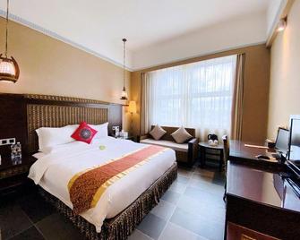 Serengeti Hotel - Haikou - Bedroom