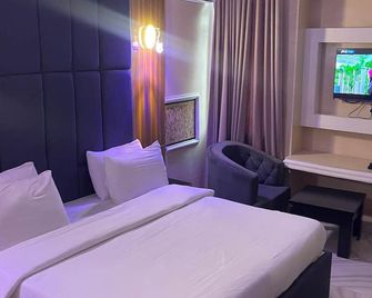 드 로스 호텔 & 스위트 - 우요 - 침실